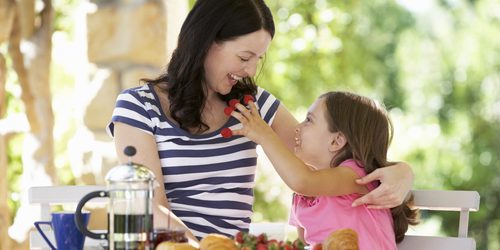 Mother and daughter eating breakfast outdoors no more power struggle