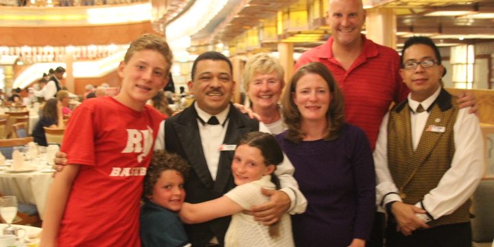 Group of diverse people smiling at a celebration event.